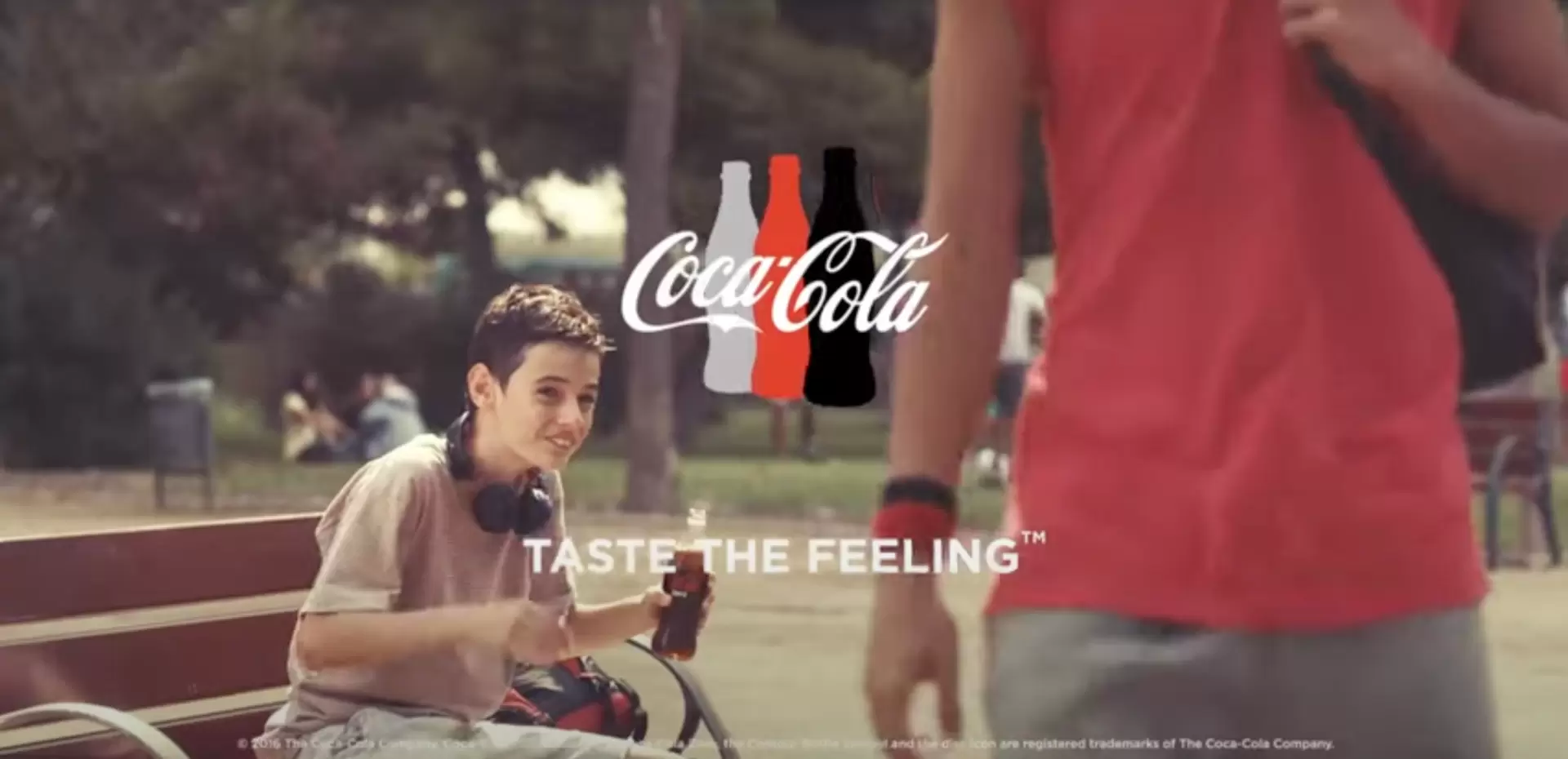 boys wearing t-shirts and drinking coca-cola